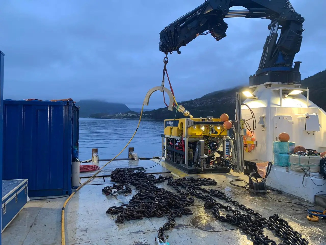 NorClean ROV lifted out over the water during deployment
