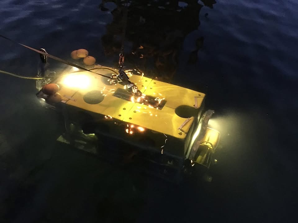 NorClean work-class ROV deployed into the water at night during a subsea operation