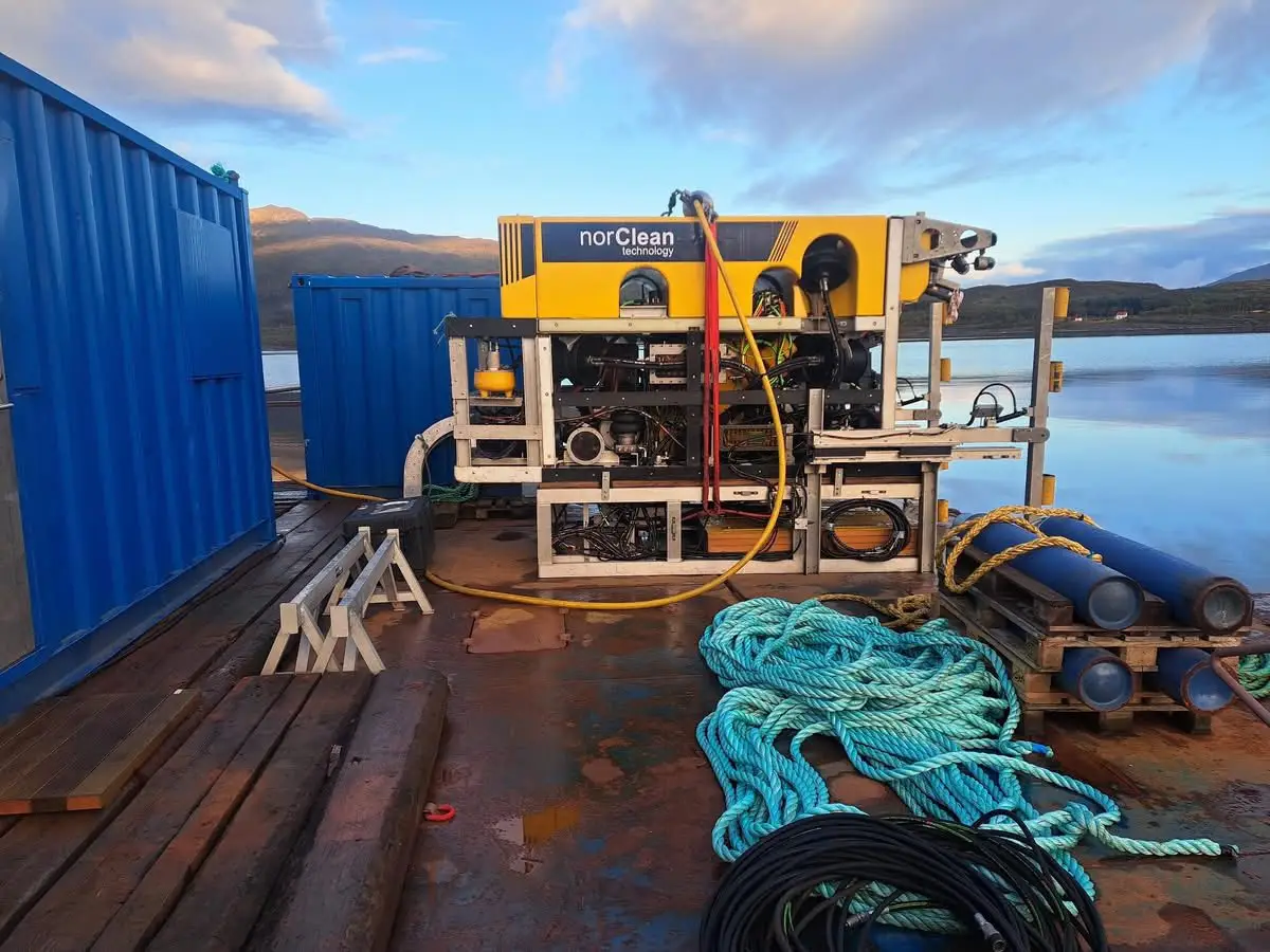 Crew in protective equipment on deck during an ROV operation